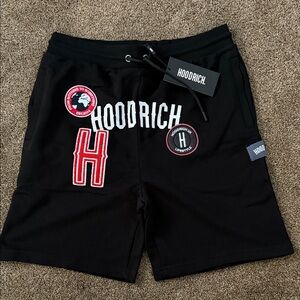 Hoodrich Men's Black Athletic Shorts with Red Patch Details